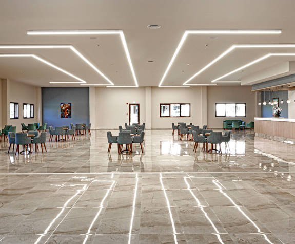 Ilis Congress Center Peloponnese Greece exhibitions lobby with tables chairs and a bar